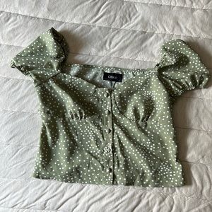 Green polka dot top